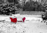Red Chair in Snow